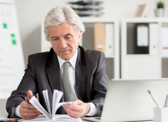 Corporate professional engaged in a high-stakes client negotiation during a video meeting, refining communication and persuasion strategies.