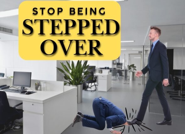 Frustrated business professional being overlooked in the office, symbolizing lack of recognition due to communication challenges.