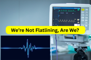 Heart monitor showing a heartbeat next to a flatline