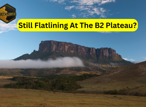 A dramatic flat-topped mountain plateau with a yellow banner that reads “Still Flatlining at the B2 Plateau?”