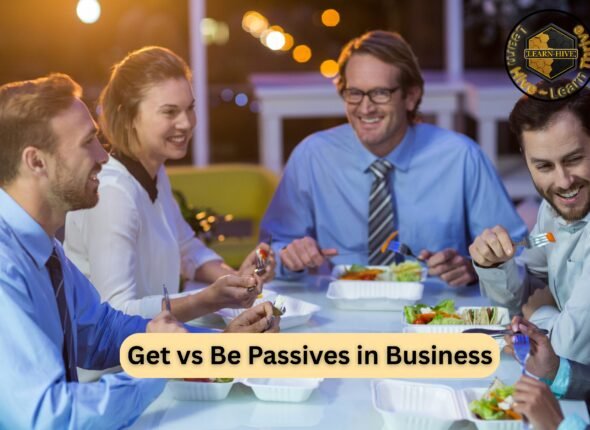 Business professionals having a casual dinner discussion illustrating conversational English and the difference between get passives and be passives in professional communication.